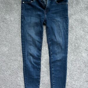Mavi mid-rise skinny jeans, dark wash.